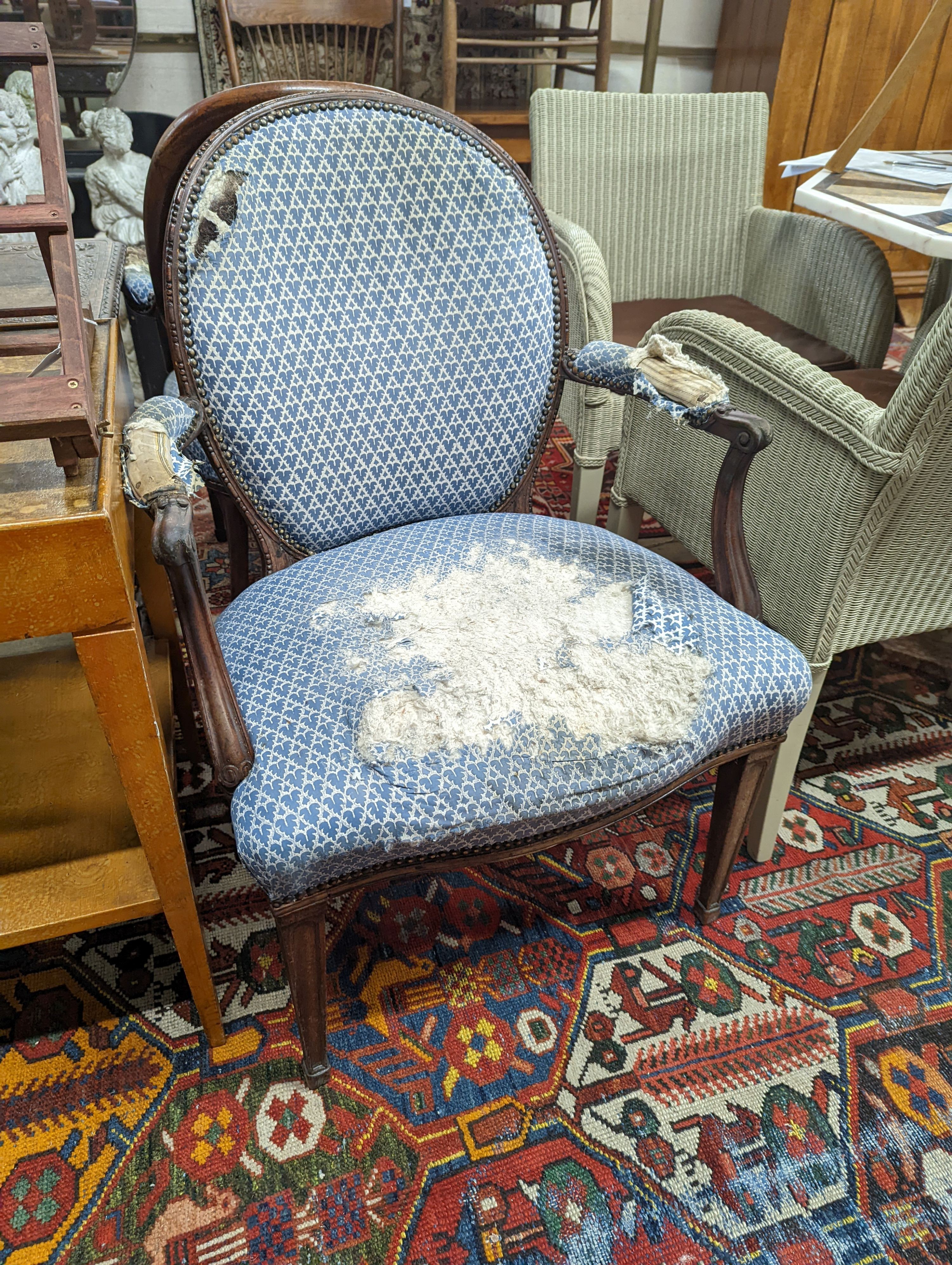 A pair of George III Hepplewhite style mahogany open armchairs, width 64cm, depth 50cm, height 92cm
